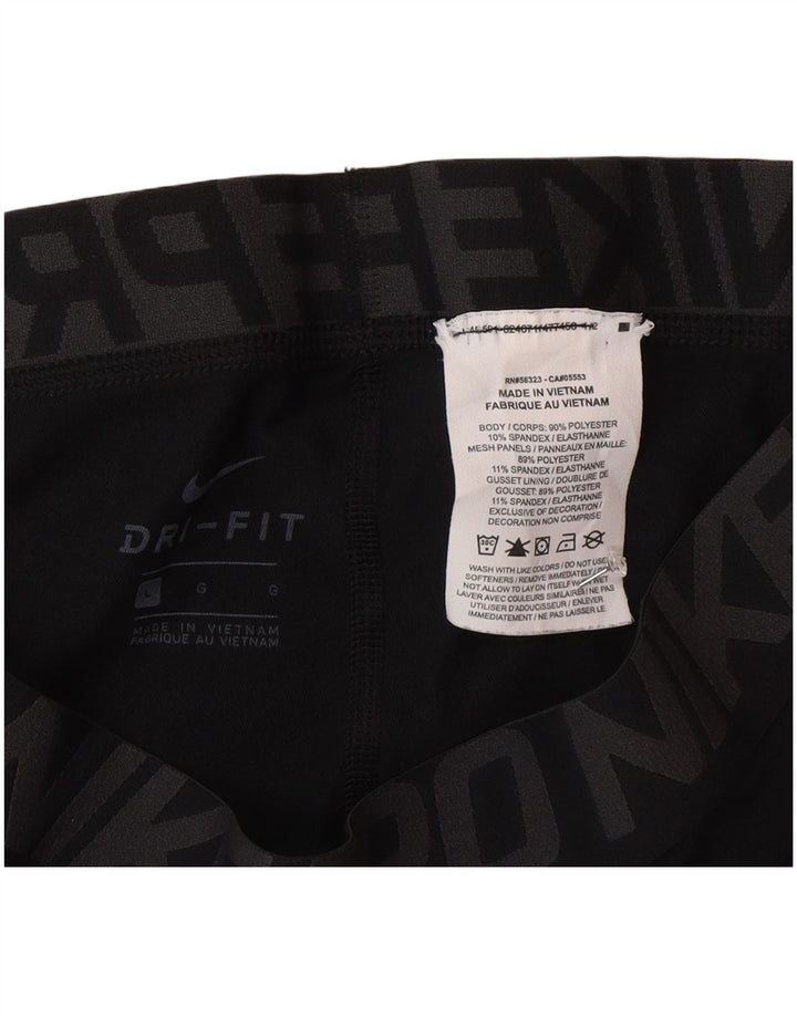 Nike Dri Fit Graphic Crop Leggings velike crne poliesterske