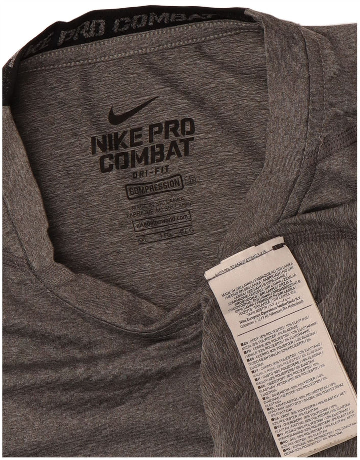 Nike ženske kompresijske tenisice UK 20 2XL sivi poliester