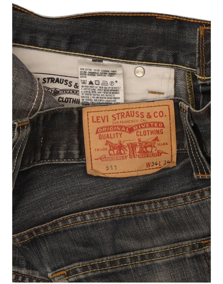 Levi's ženske 511 uske traperice W34 L34 tamnoplavi pamuk