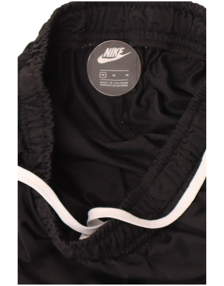 NIKE Ženska trenirka Hlače Joggers UK 12 srednje crna
