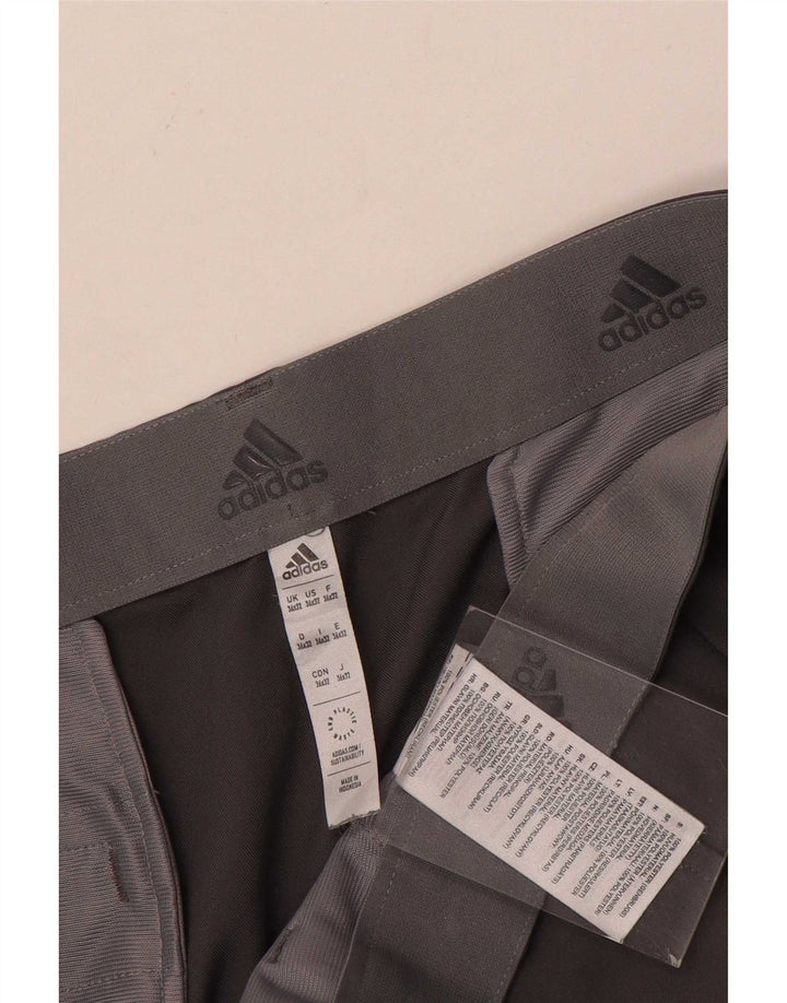 Adidas muške ravne chino hlače W36 L32 sivi poliester