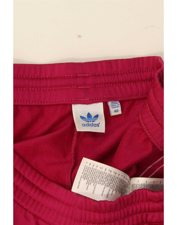 Adidas Ženska trenirka Hlače Joggers EU 40 srednje ružičasti poliester
