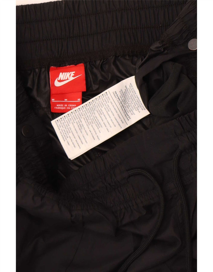 Nike ženske joggers vodootporne hlače UK 12 srednji crni poliester