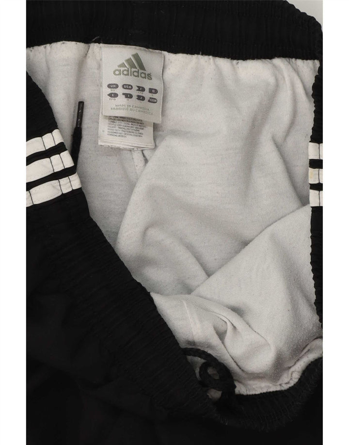 Adidas muške trenirke Hlače Joggers Srednji crni poliester