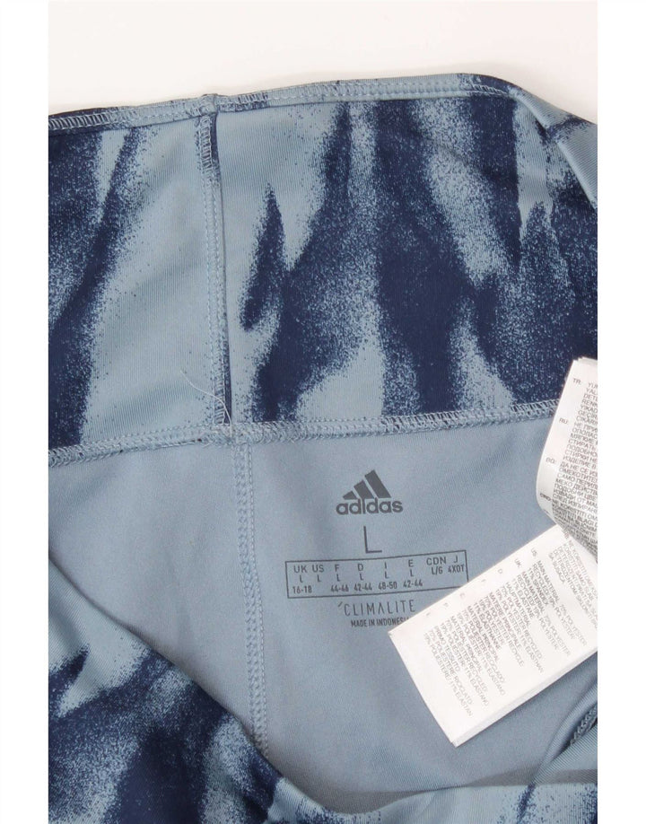 Adidas ženske tajice s apstraktnim uzorkom Climalite UK 16/18 velike plave