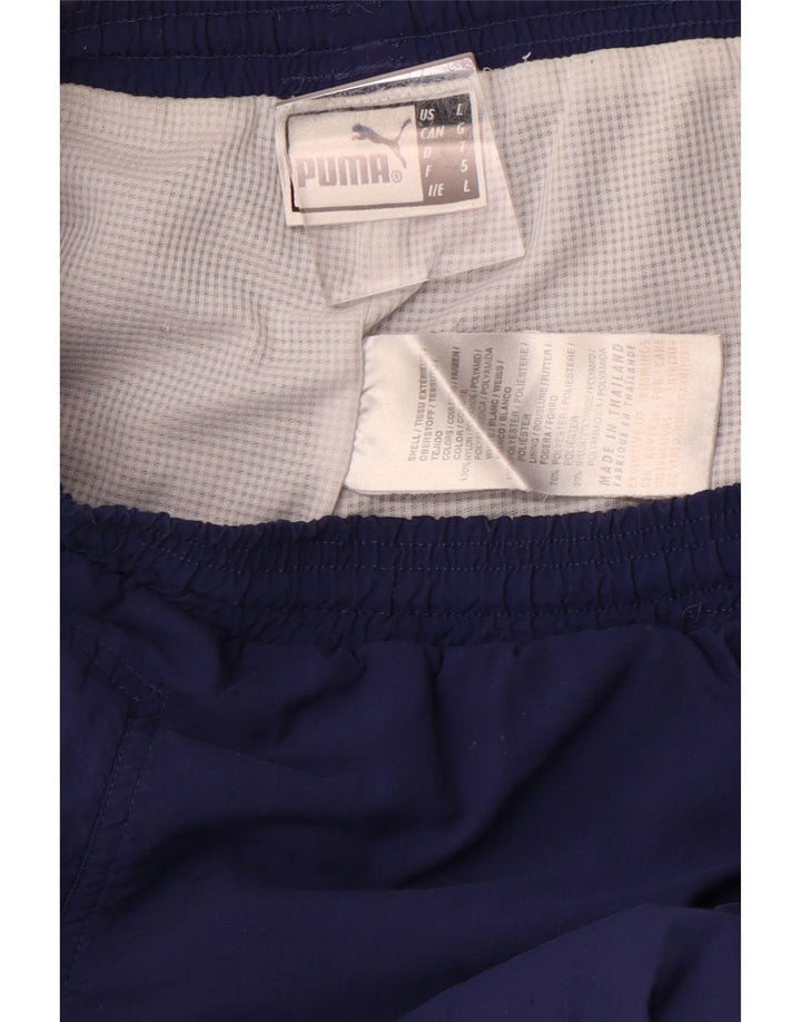 PUMA Ženska trenirka Hlače Joggers Large tamnoplave najlonske sportske