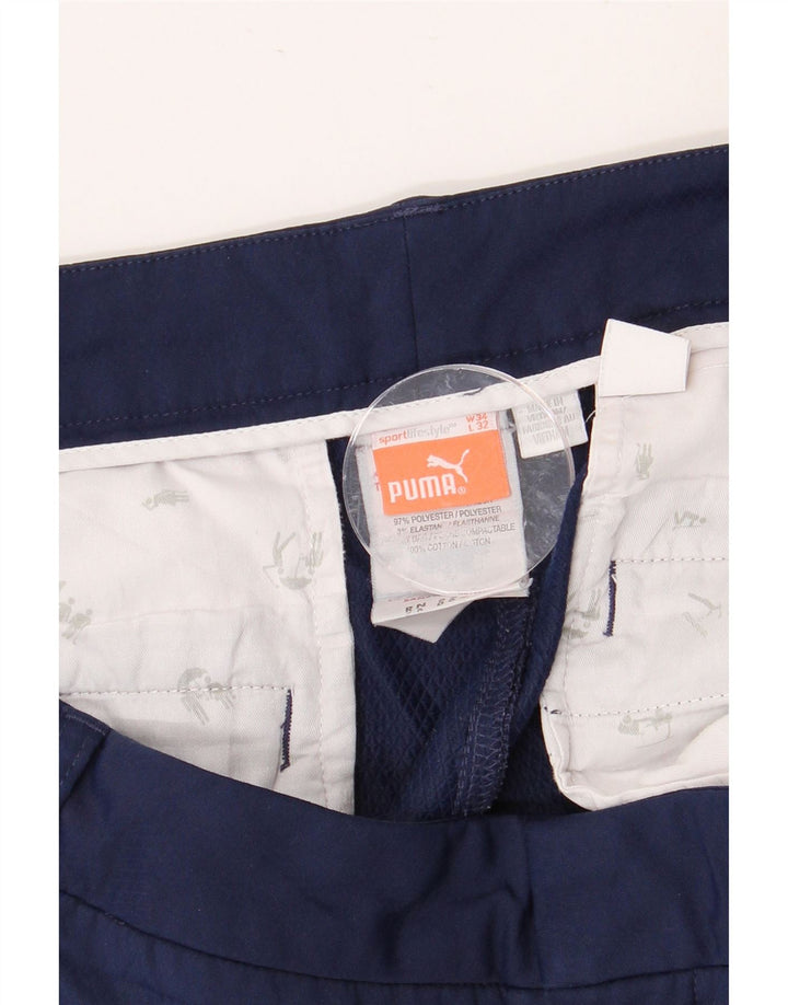 PUMA muške uske chino hlače W34 L32 tamnoplavi poliester