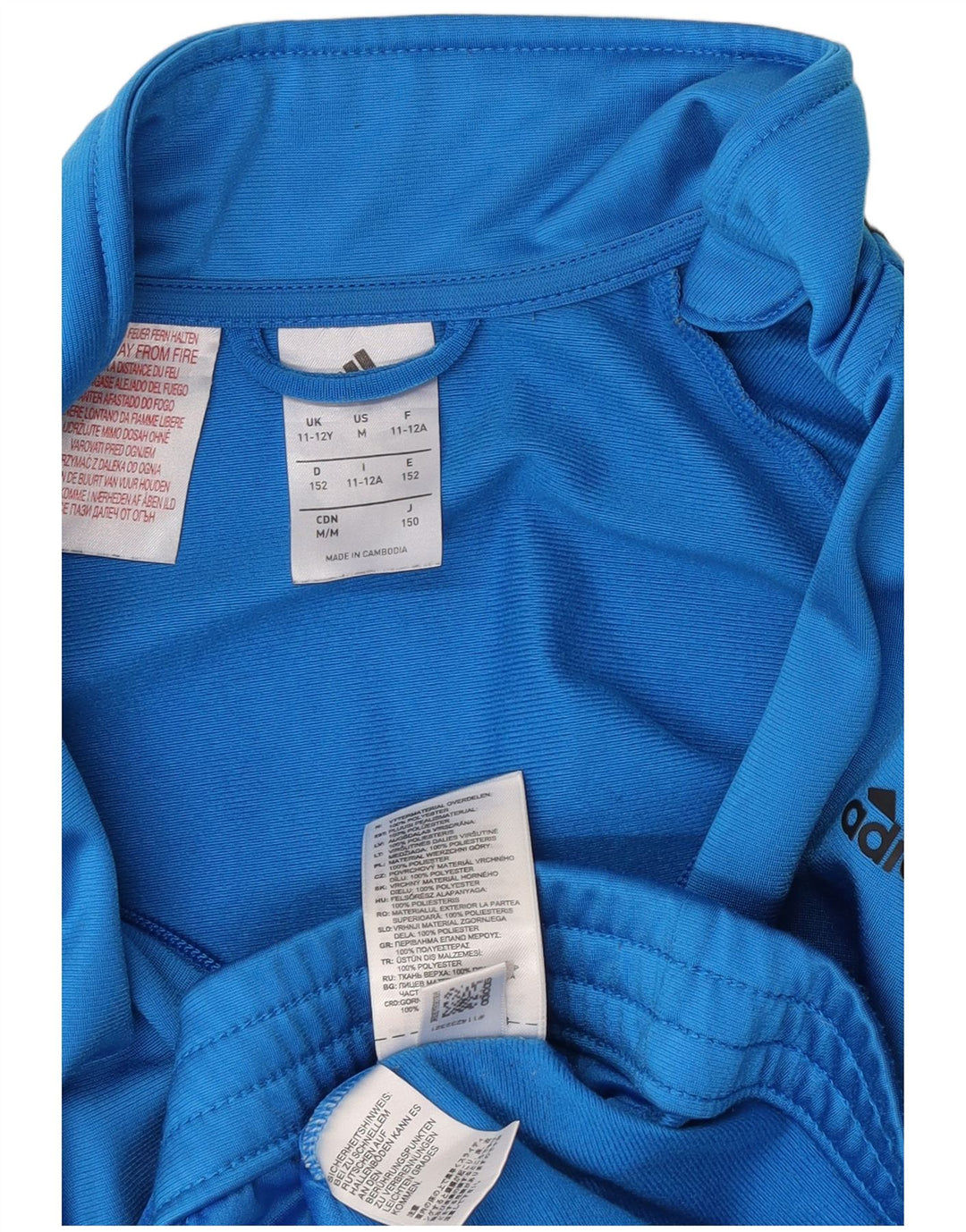 Adidas trenirka za dječake 11-12 godina plava poliesterska boja