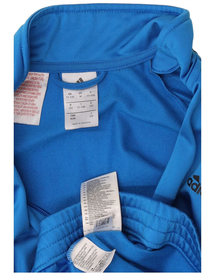 Adidas trenirka za dječake 11-12 godina plava poliesterska boja