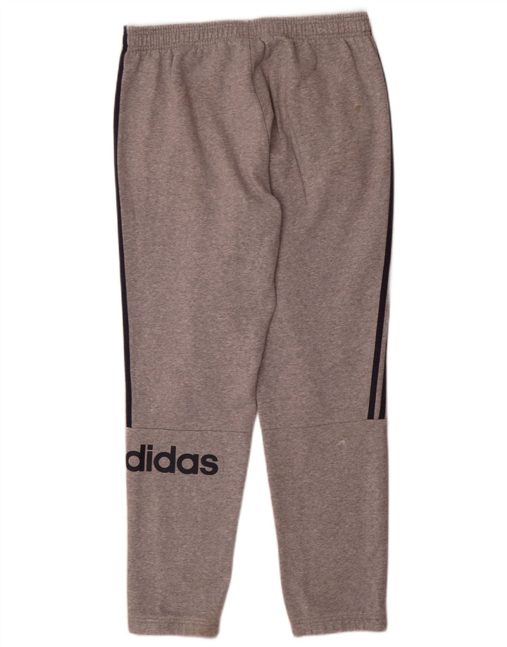 Adidas velike sive pamučne trenirke s grafičkim motivima