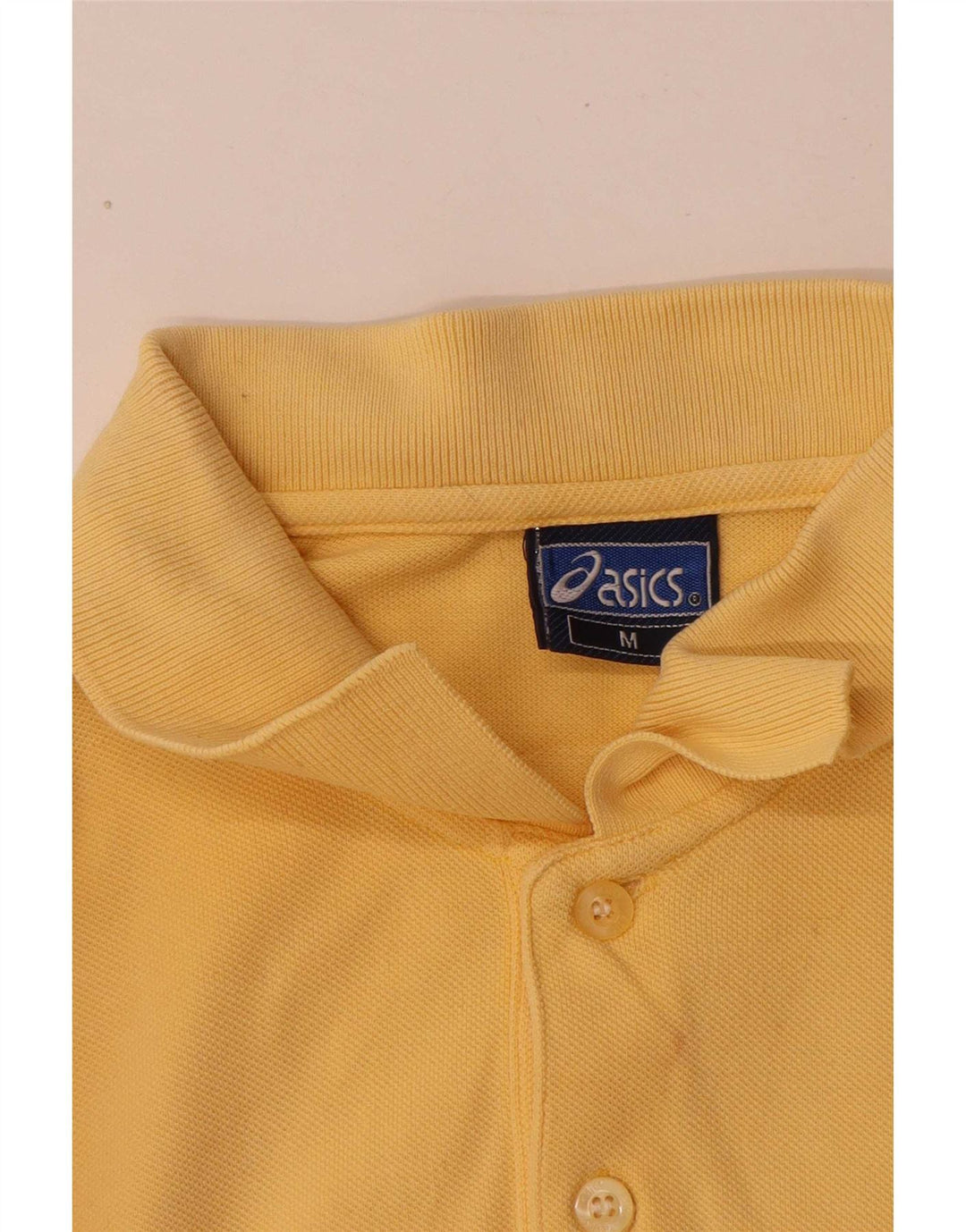 Asics muška polo majica srednje žute pamučne boje