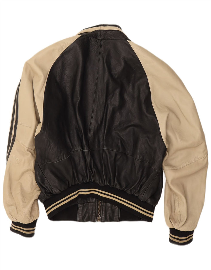 Vintage muška kožna jakna UK 38 srednje crna janjeća koža