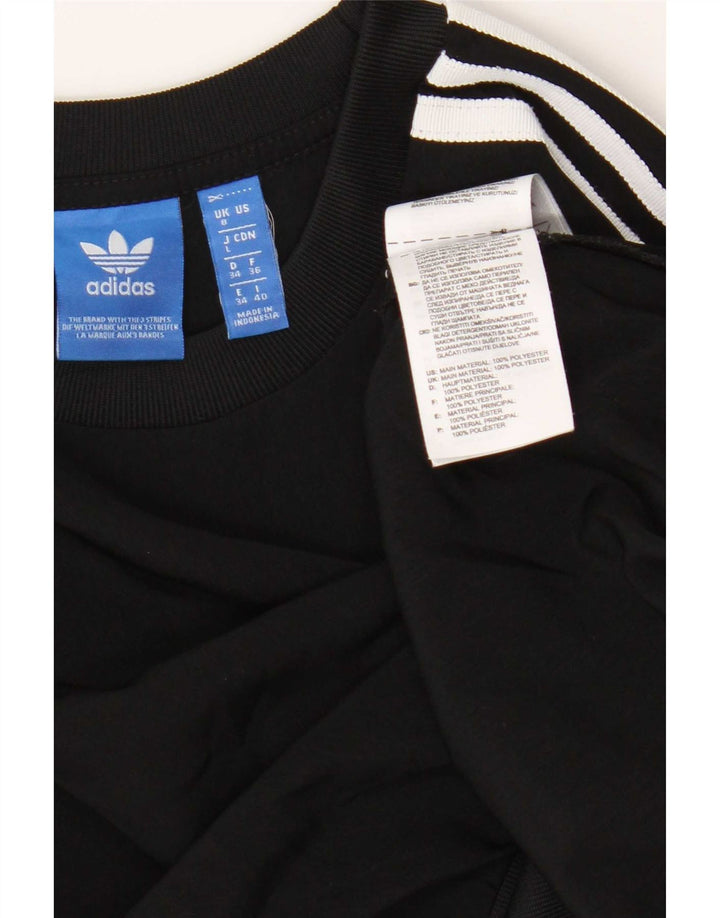 Adidas ženski kratki džemper prekomjerne majice UK 8 mali crni poliester