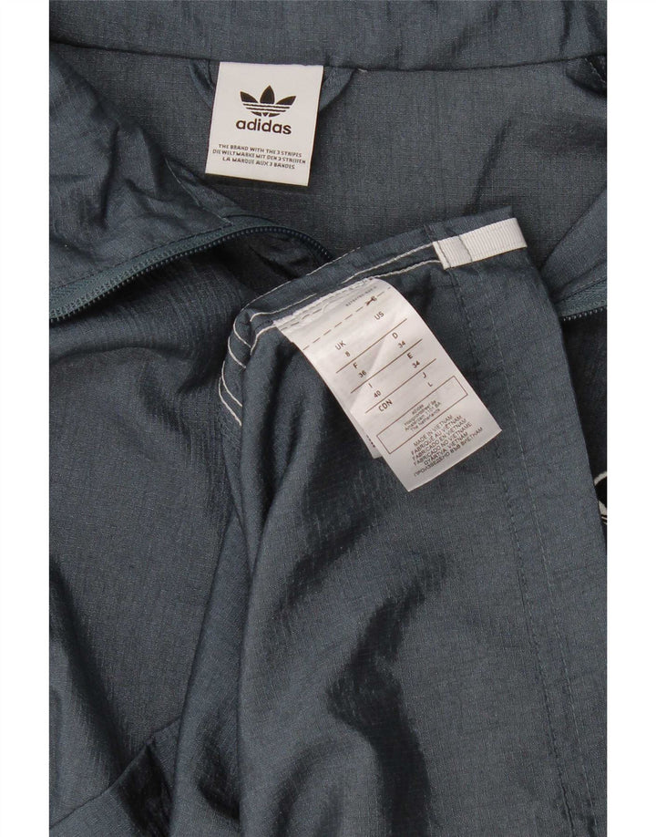 Adidas ženska velika pomoćna jakna UK 8 Small Blue Polyamide