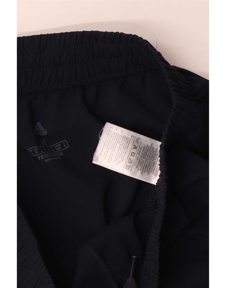 Adidas muške hlače od trenirke srednje tamnoplave poliesterske boje