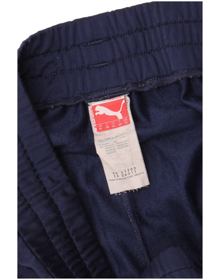 PUMA Ženska trenirka Hlače Joggers UK 12 Medium tamnoplavi poliester