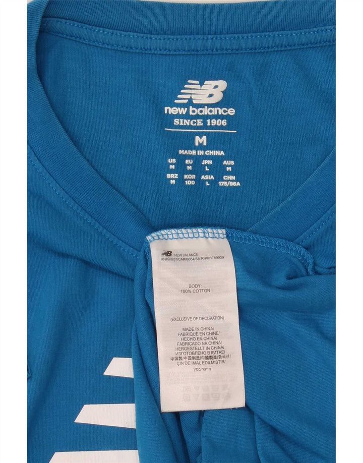 New Balance muška majica s grafičkim motivima srednje plavi pamuk