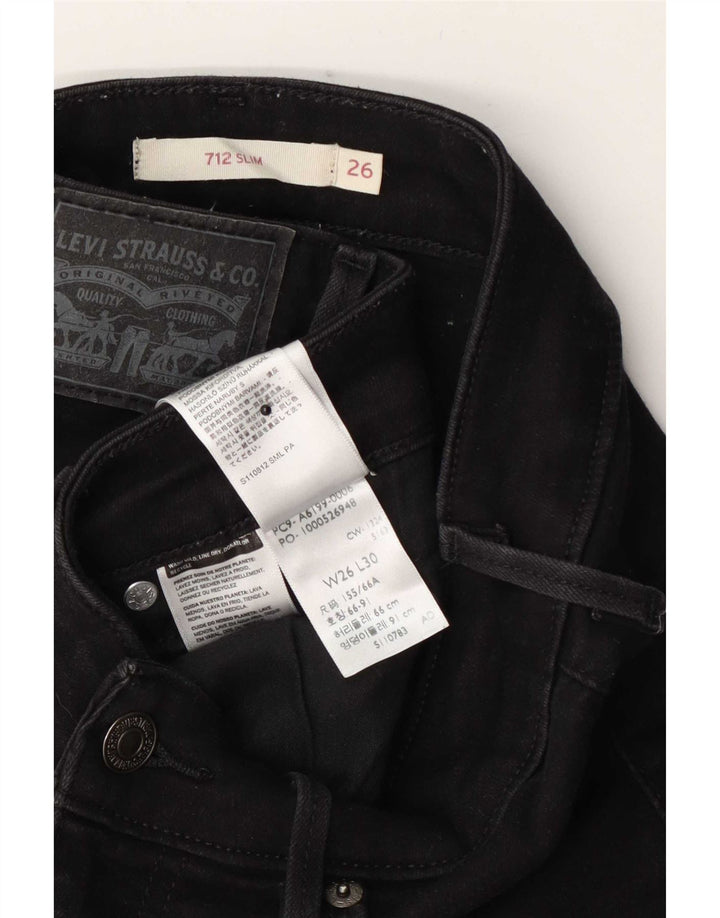 Levi's ženske 712 uske traperice W26 L30 crni pamuk