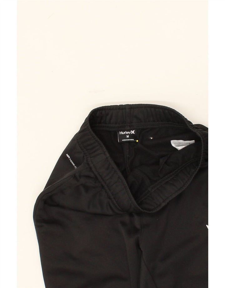 HURLEY Boys Tracksuit Trousers Joggers 10-11 Years Medium Black Vintage Hurley and Second-Hand Hurley from Messina Hembry 