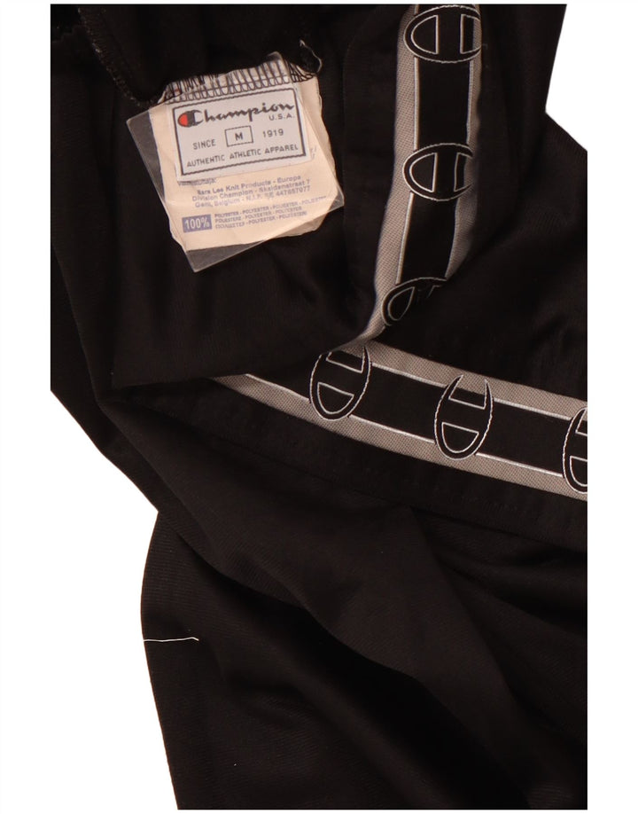 CHAMPION Ženske grafičke trenirke Hlače UK 12 Srednje crni poliester