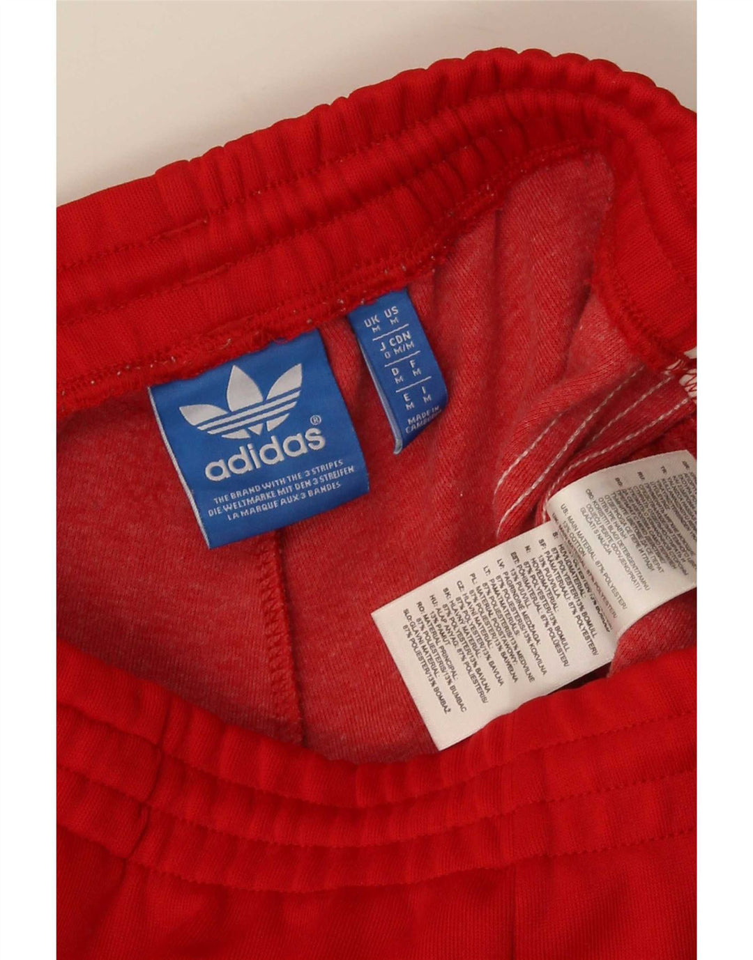 Adidas muške trenirke hlače Joggers srednje crvene boje od poliestera
