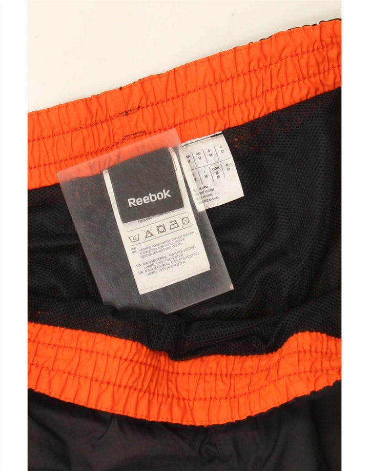 Reebok muške trenirke Hlače Joggers Srednji crni poliester