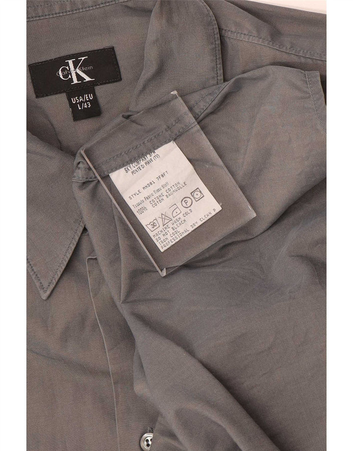 Calvin Klein muška košulja veličine 43 veliki sivi pamuk