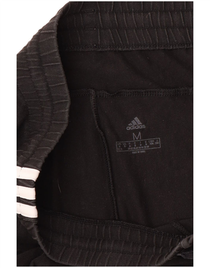ADIDAS Ženska trenirka Hlače Joggers UK 12/14 srednje crna