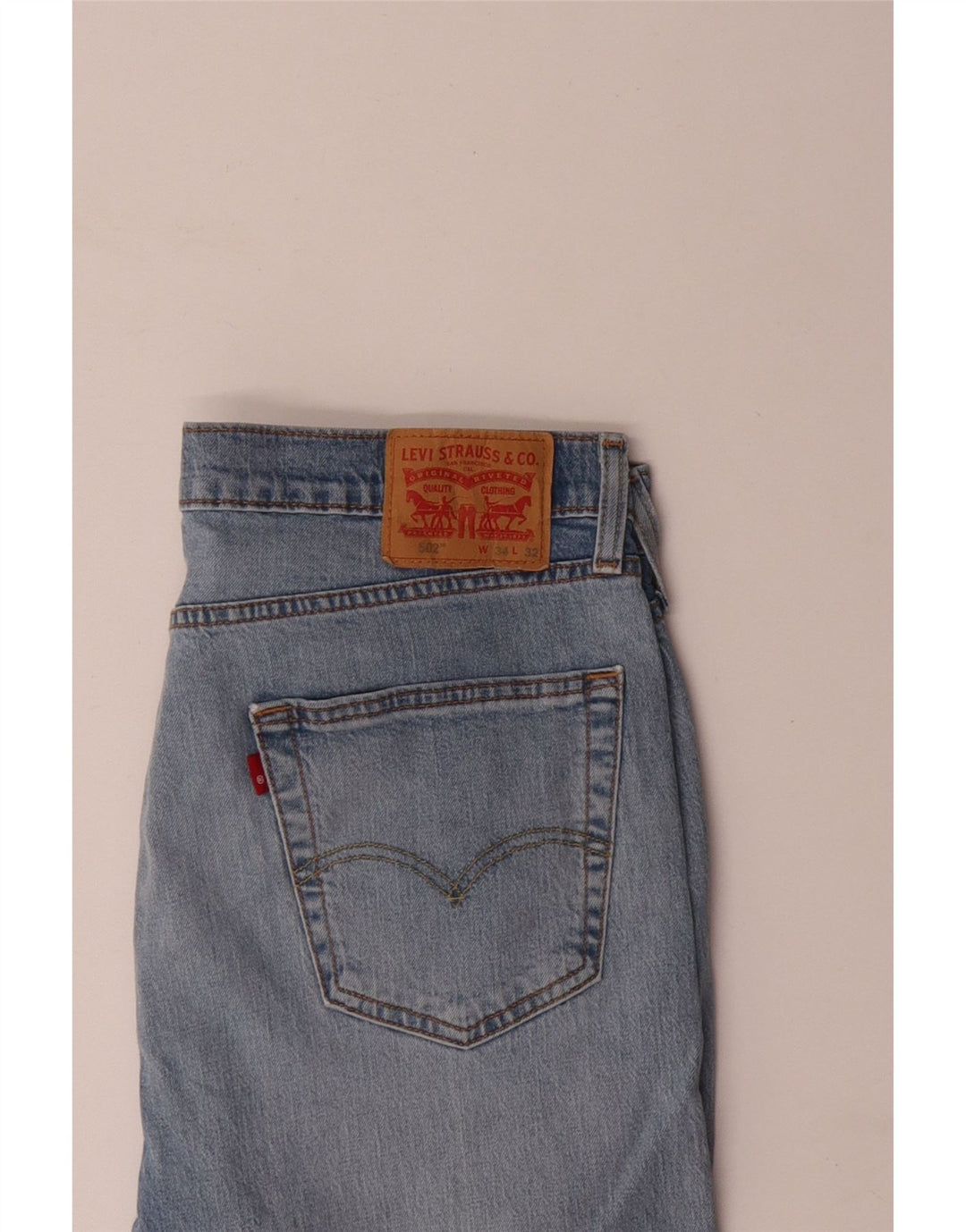 Levi's muške 502 sužene traperice W34 L32 plavi pamuk