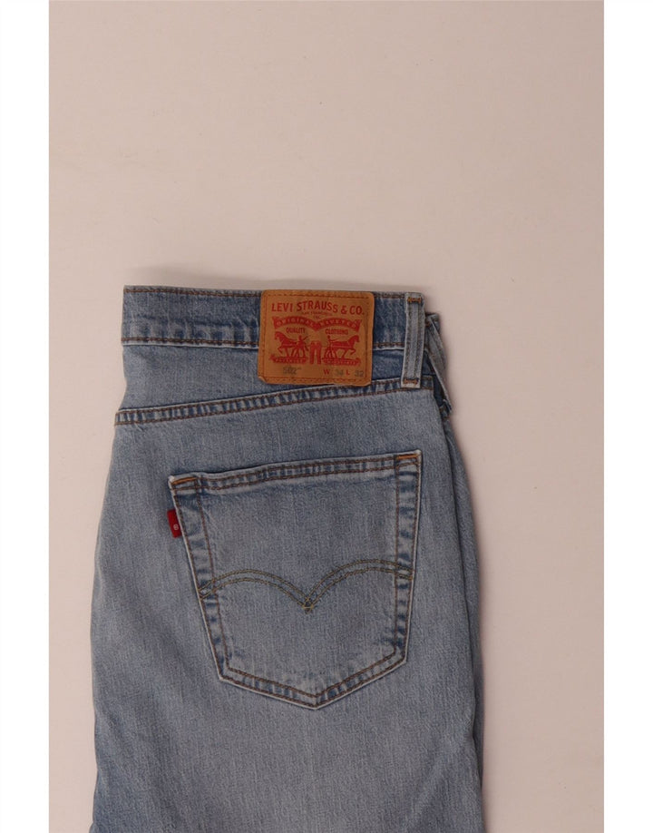 Levi's muške 502 sužene traperice W34 L32 plavi pamuk