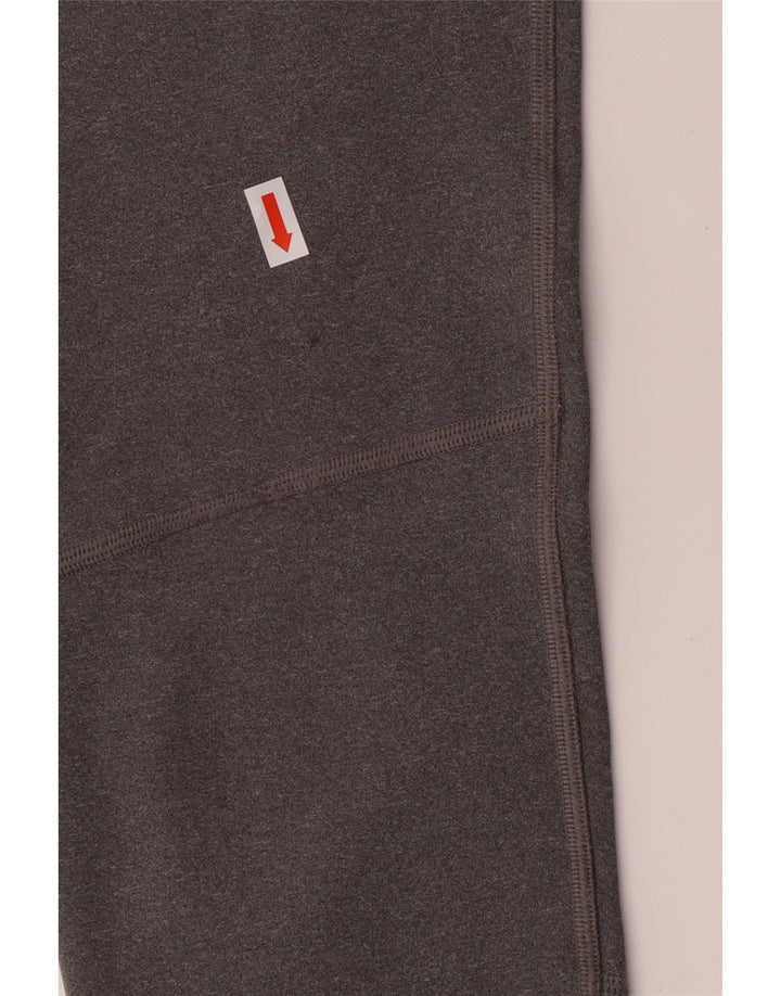 NIKE Girls Dri Fit Graphic Leggings 12-13 Years Large Grey Colourblock