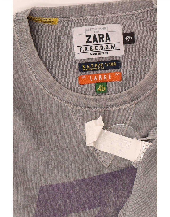Zara muška trenirka s grafičkim motivima, veliki sivi pamuk