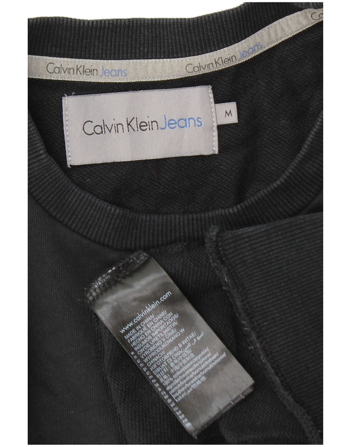 Calvin Klein Jeans muška trenirka s grafičkim motivima Srednji crni pamuk