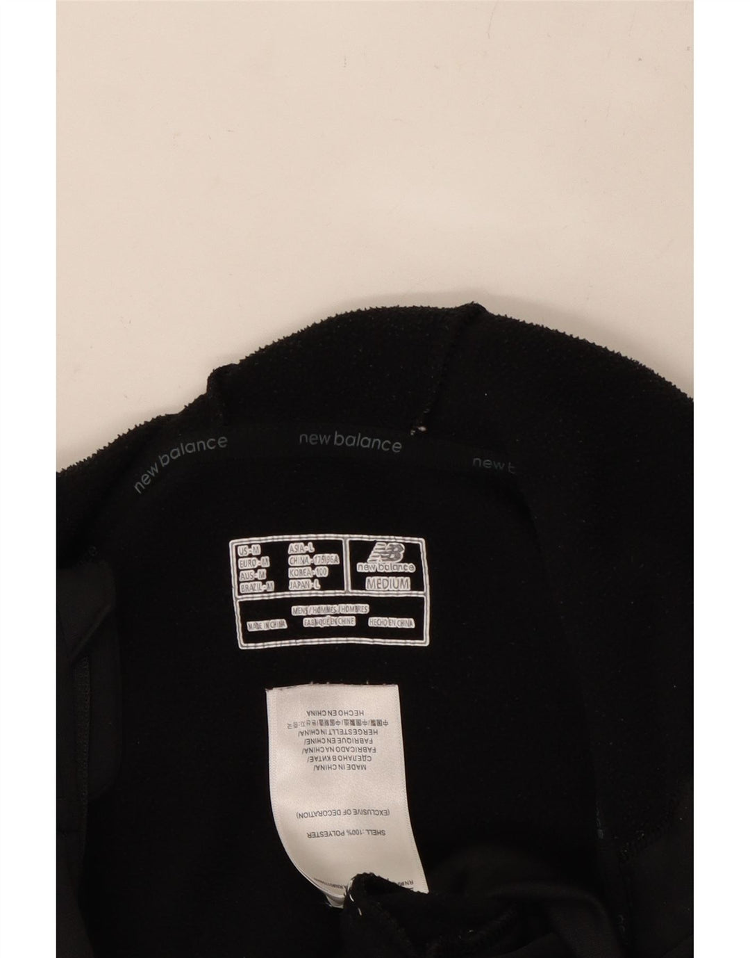 NEW BALANCE Muški pulover s kapuljačom s patentnim zatvaračem srednje crne boje od poliestera