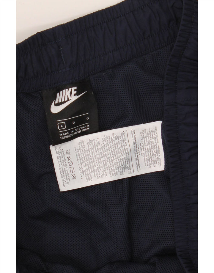NIKE Mens Tracksuit Trousers Joggers Large  Navy Blue Polyester Vintage Nike and Second-Hand Nike from Messina Hembry 