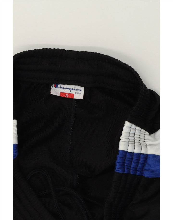 CHAMPION Mens Graphic Tracksuit Trousers Medium  Black Colourblock Vintage Champion and Second-Hand Champion from Messina Hembry 