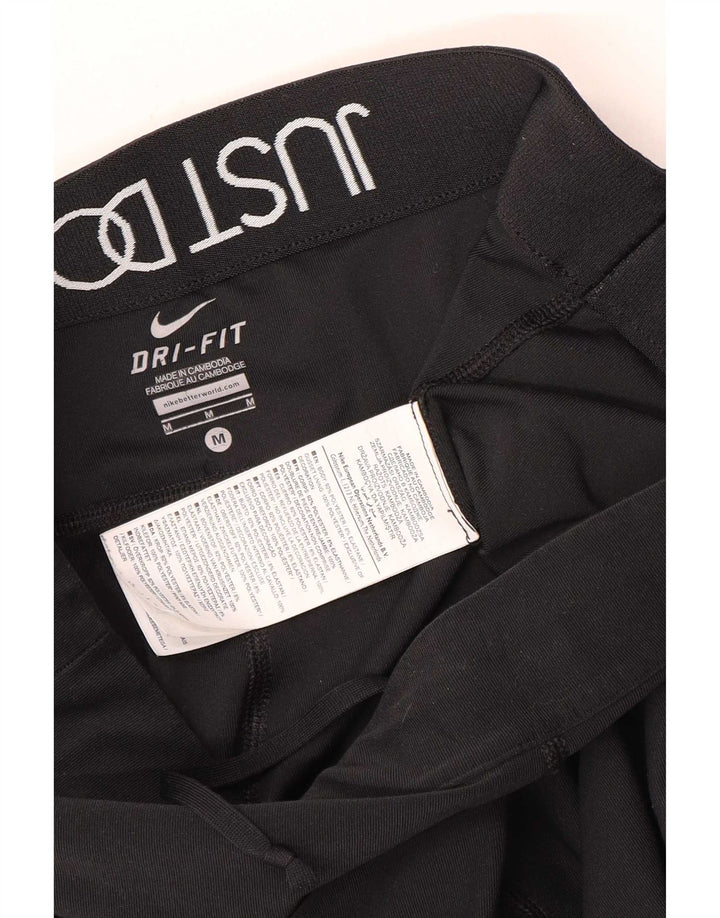Nike ženske Dri Fit Capri tajice UK 14 srednje crne