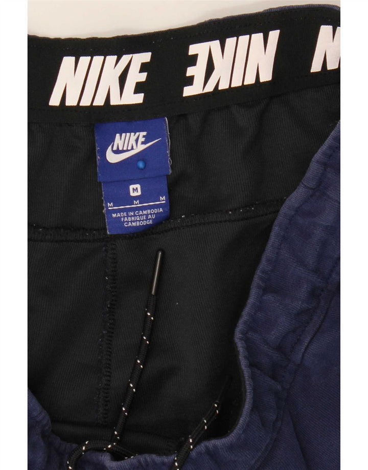 Nike muške trenirke Hlače Joggers srednje tamnoplavi pamuk