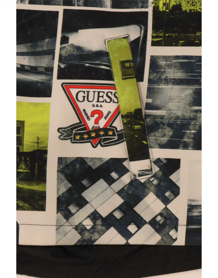 Guess Boys Graphic Reverzibilna jakna 11-12 godina, višebojna geometrijska