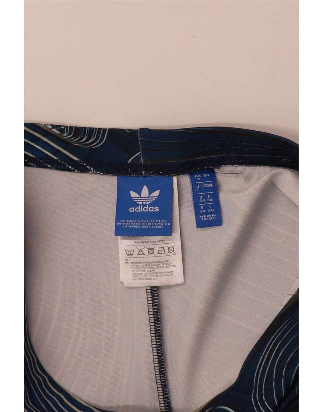 Adidas ženske tajice s apstraktnim uzorkom UK 8 Male tamnoplave poliesterske