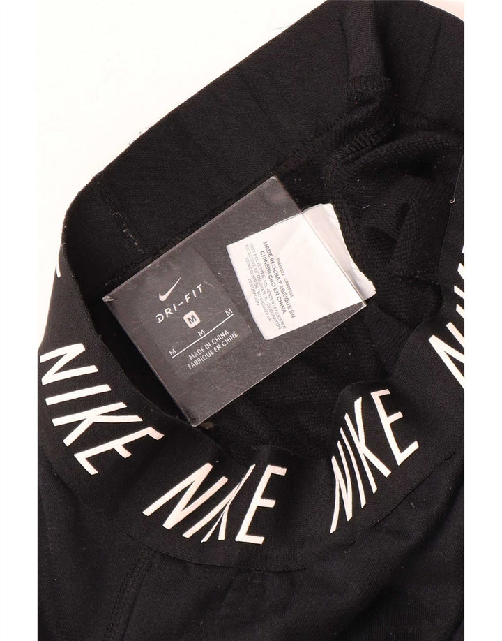 Ženske hlače za trenirku Nike Graphic, Joggers UK 12 Srednje crni poliester