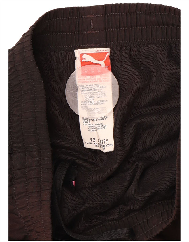 PUMA Hlače za trenirku za dječake 15-16 godina crne poliesterske boje